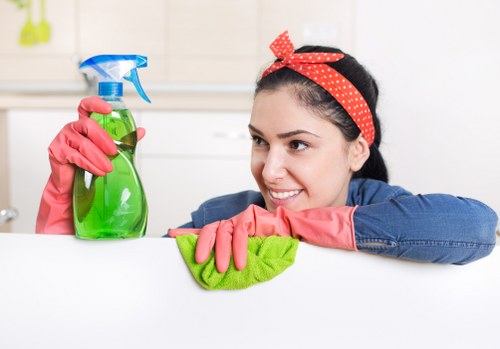 Cleaning a modern office kitchen and shared workspace in W8