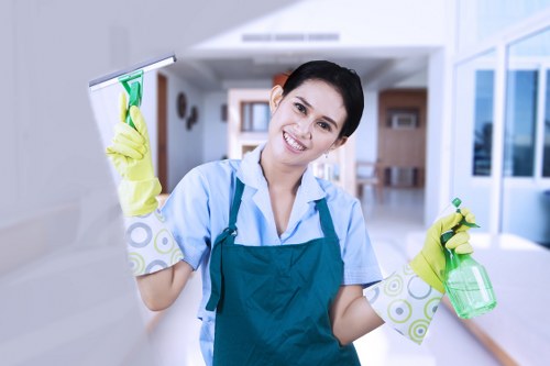 Local carpet cleaner working in a W8 apartment hallway
